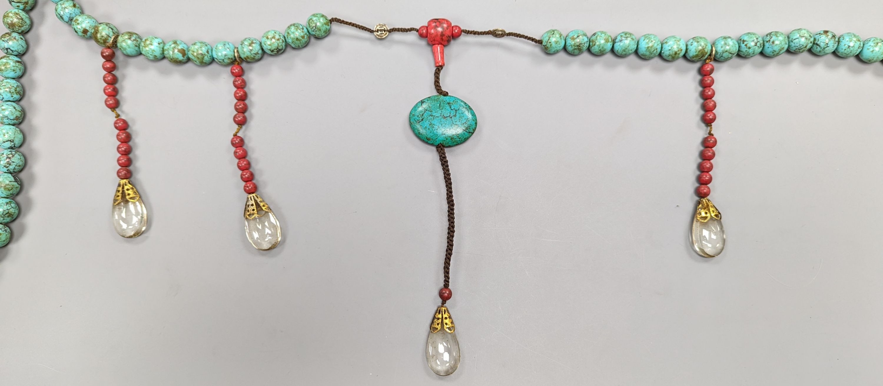 A Chinese turquoise matrix court style necklace in a hardwood box